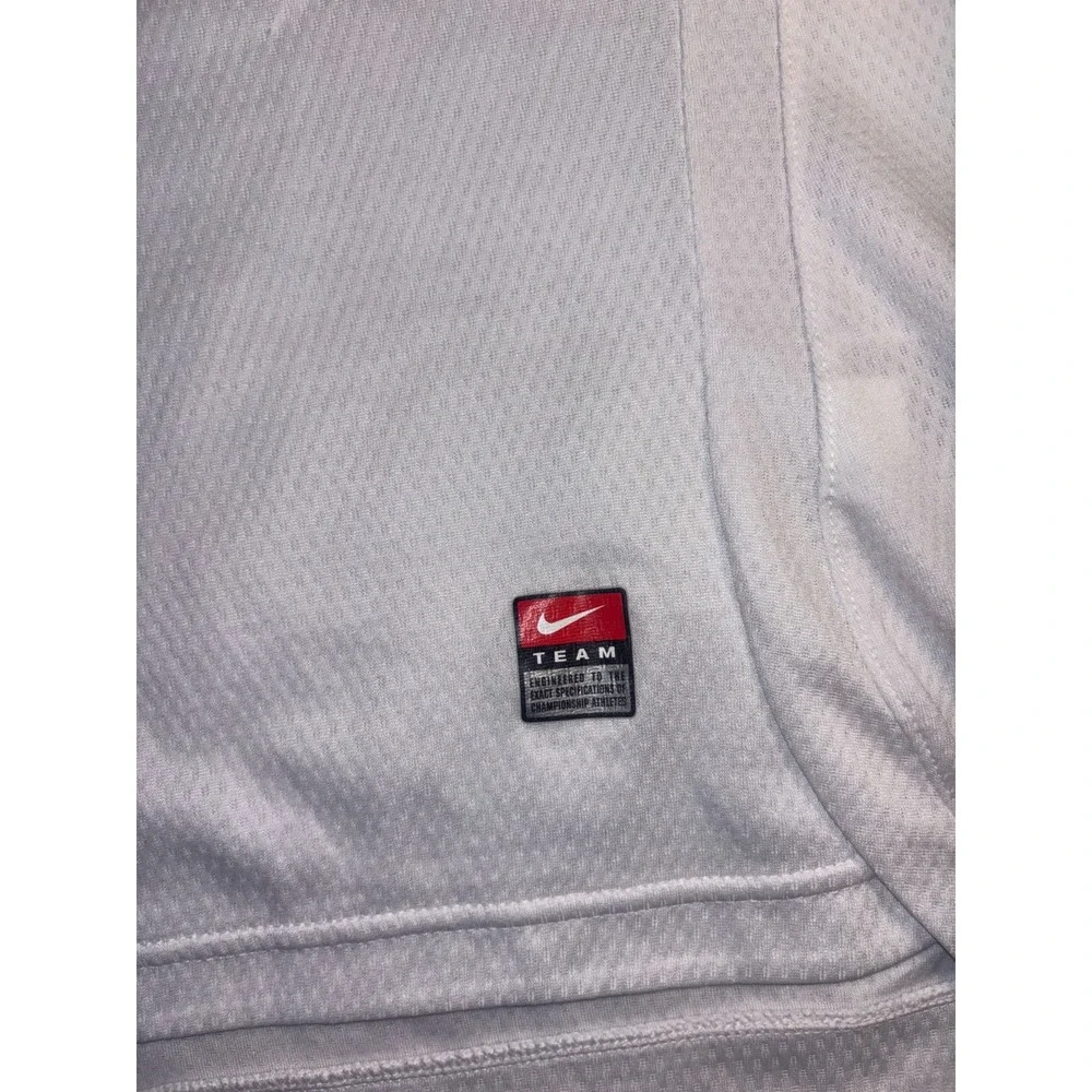 Nike Jersey Womens S/M White Mesh Stretch Embroidered Logo High Low Split V Neck